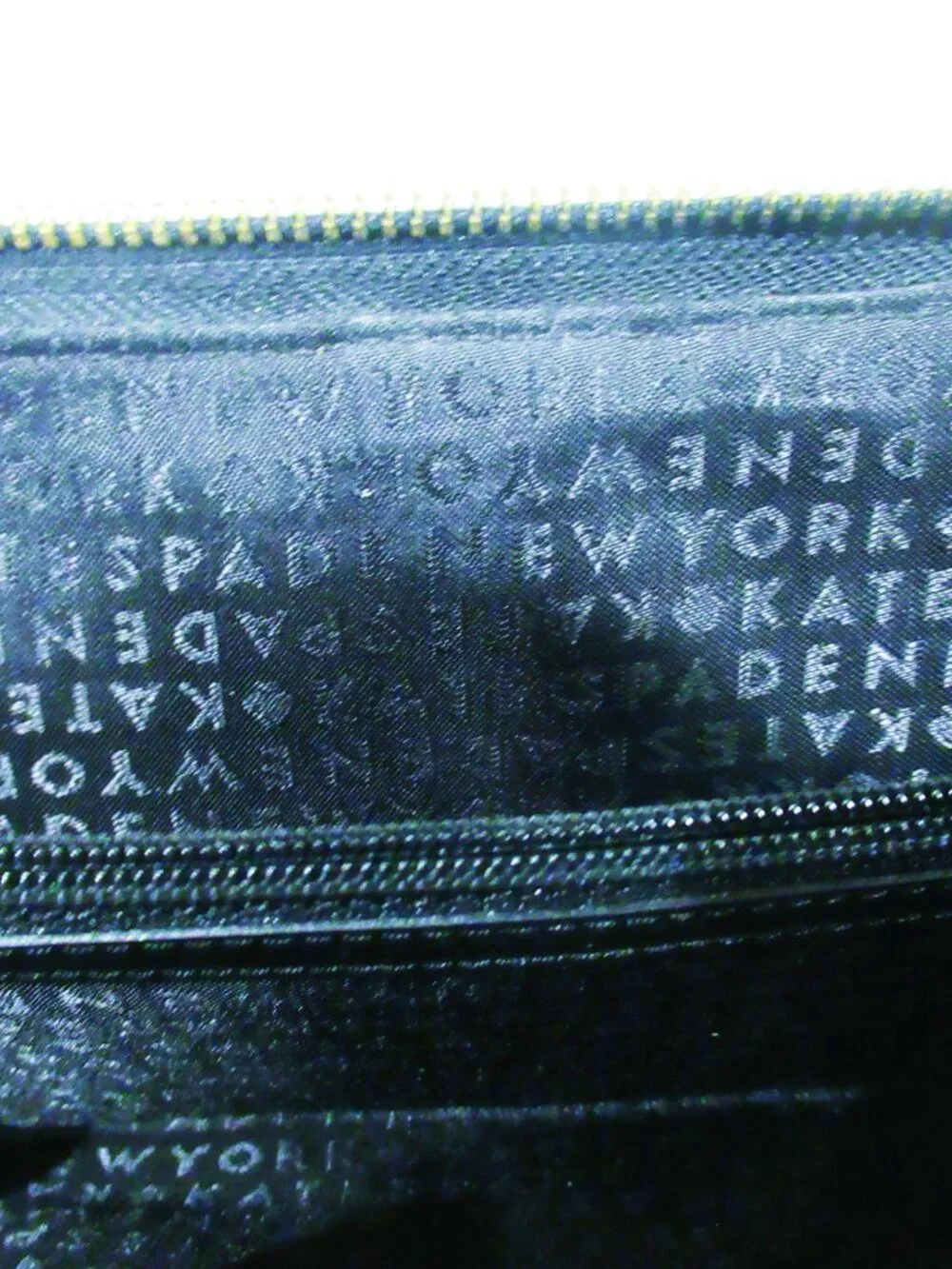 Kate Spade New York black leather wristlet / wallet